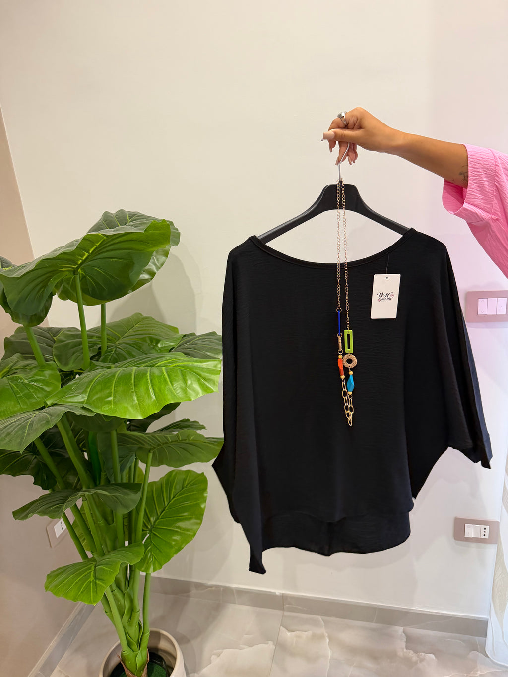 Blusa con collana