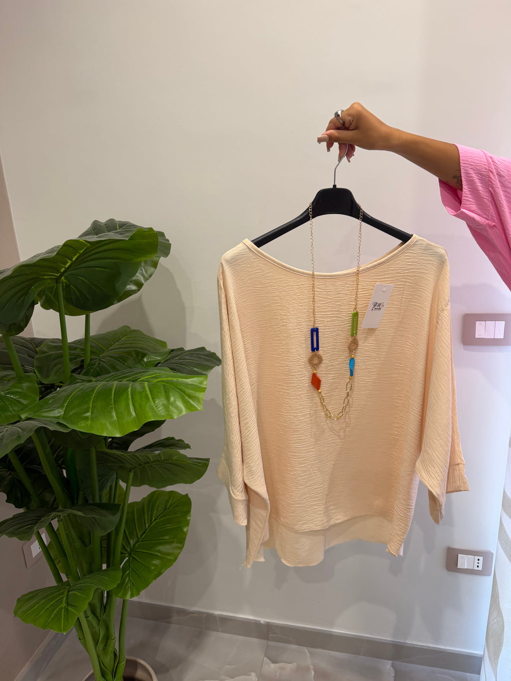 Blusa con collana